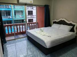 The Guinness Guesthouse, hotell i Jomtien Beach