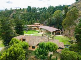 Chalet Campestre la Peseta, מלון בUbaté