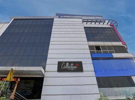 Capital O Hotel Surabhi Elite Near Miraj Cinemas - Shalini Shivani, hotel in Surūrnagar