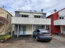 An inner city 4-bedroom house with two carparks