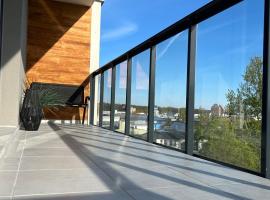 Apartament Przy Porcie z klimatyzacją, garażem i rowerami