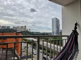 Por do sol desde uma rede na varanda da zona sul