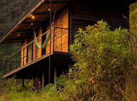 Ecolodge Cuentos de Agua ชาเลต์ในVillamaría