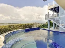 On The Rocks, 8 bed, 8,5 bath, Waterfront home with boat dock and rooftop deck