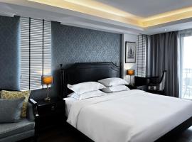 Glory Boutique Suites 清迈古城荣耀精品酒店, apartment in Chiang Mai