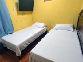 Habitación 2 Camas Individuales, Baño Compartido, place to stay in Matamoros