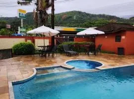 Flat em Juquehy - Condomínio com portaria e com piscina próximo praia