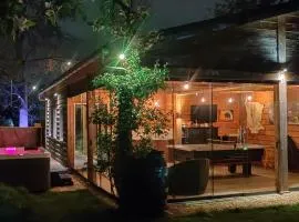 Ecolodge Tilburg met zwembad in groene oase bij centrum