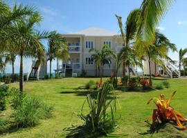 Coastal Haven: Charming Beachfront Cottage with Pool, cottage in James Cistern