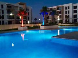 Prestigia Plage des nations APP 1 ch , 1 suite parentale et grand séjour, hotel in Sidi Bouqnadel