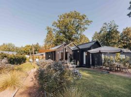 Kos I Tiny house met grote tuin, microcasă din Epe