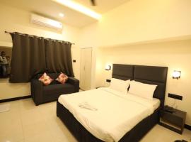 Hotel Parashar Palm: Nagpur, Dr. Babasaheb Ambedkar Uluslararası Havaalanı - NAG yakınında bir otel