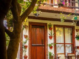 Gypsy Garden Guesthouse & Homestay, nakvynės su pusryčiais namai mieste Kosgoda