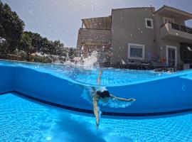 Four Seasons private villa - seaview - big heated pool - gym - sport activities, villa em Gouves