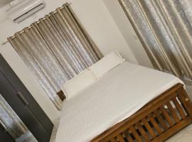 Peaceful homes, hotel em Thrissur