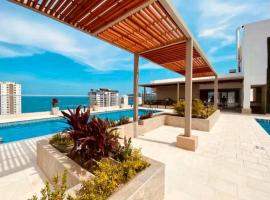 Hermoso ApartaSuite en Playa Salguero!/Rodadero, beach hotel in Gaira