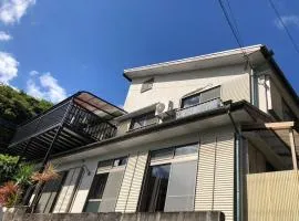 ゲストハウス なないろ
