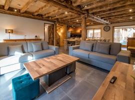 Chalet montagnard rénové avec jacuzzi 4****- 15 Personnes, hótel í Saint-Sorlin-dʼArves