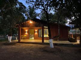 The Mango Woods Cottage with Bathtub in Alibag with Swimming Pool, cottage à Alībāg