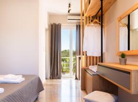 Melador beachfront apartments: Kavos şehrinde bir otel