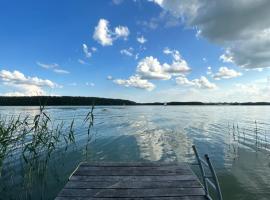 Dom z linią brzegową nad jeziorem Ryńskim - Mazury Wejdyki, ваканционно жилище в Wejdyki