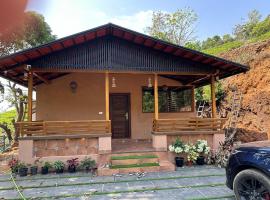 Amour Estate, cottage in Periya