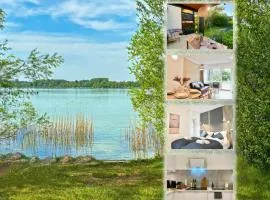 Snug Stays 2 - Design 1-Zimmer-Studio am See mit Terrasse, Garten, Badestelle vor dem Haus