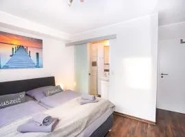 Ferienhaus Auszeit - Wohnung "Strandmuschel"