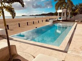 Casa frente al mar en Antigua, מלון בJolly Harbour