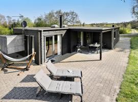 Amazing Home In Lgstr With Kitchen, semesterhus i Trend