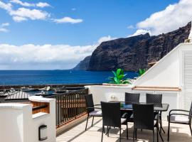 OCEAN PANORAMA - 3 AC bedrooms, private garage, pool, 2 bathrooms, tv channels, hotel in Acantilado de los Gigantes