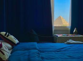 Three pyramids view INN โรงแรมที่Gizaในไคโร