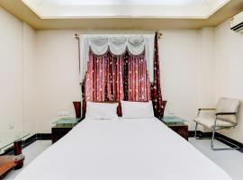 OYO Hotel M & c, hotell i Patna