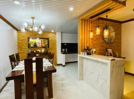 Transient Homestay Eastwood Baan, guest house in Butuan