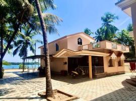 Cozinn B205 4bhk Riverfront Villa with beach view, hotel en Kalyānpur