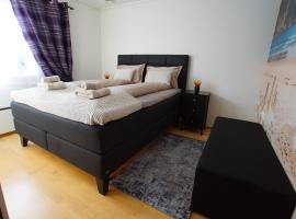 Cozy room in a house with a garden on the island of Askøy, near Bergen, hótel í Askøy