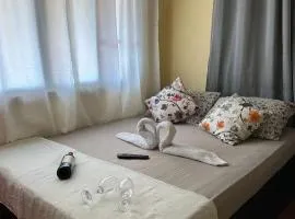 Quarto com Ar à 500m da praia Espaco Aconchego do Gugu