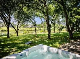 Deep Water on the Blanco- Wimberley riverfront close to town, 5 bed, 6 bath!