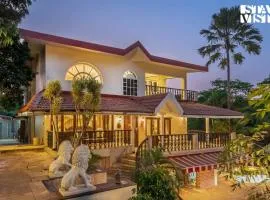 StayVista's Hillside Serenity - Hill-view villa with Outdoor pool, Bar, Spacious lawn, and Indoor & Outdoor activities