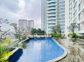 RedLiving Apartemen Grand Kamala Lagoon by Ownr Room, hotel with parking in Pekayon Satu