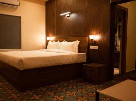 Poojaris Nirantara - Mysuru, hotel v destinaci Hampāpura