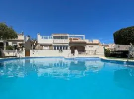 Holiday home with large roof terrace near La Mata beach