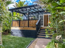 Jungle Cottage Escape, vakantiewoning aan het strand in Auckland