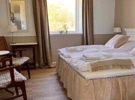 Munkgaard INN & OUTDOOR, hotel din Rødvig