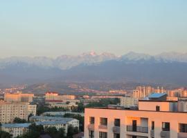 Alpine serenity deLuxe apartment with MOUNTAIN views near the ADK shopping center and Sairan METRO station, skianlegg i Almaty