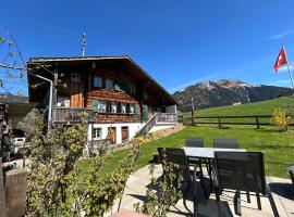 Alpenchalet Haldeli Gstaad Fereienwohnung im 1-Stock, cabin sa Gstaad