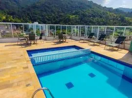 Apartamentos a 200m praia das Toninhas - Condomínio Vista Verde | Piscina na Cobertura com vista Espetacular