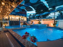 Bernese Resort Hotel powered by Cocotel, hotel con estacionamiento en Ligao