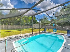 Deltona Home with Saltwater Pool and Sunroom!, hotel in Deltona
