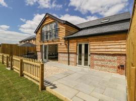 Threshing Barn, hotel com estacionamento em Blandford Forum